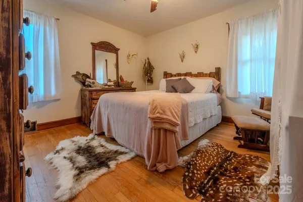 a bathroom with a mirror and a shower