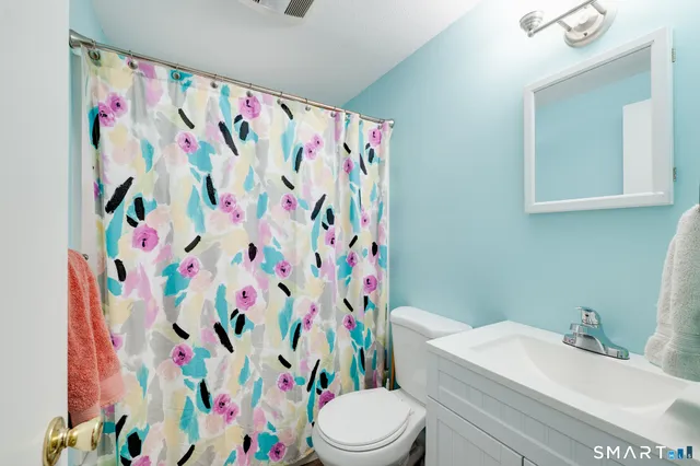 a room with furniture and a flat screen tv