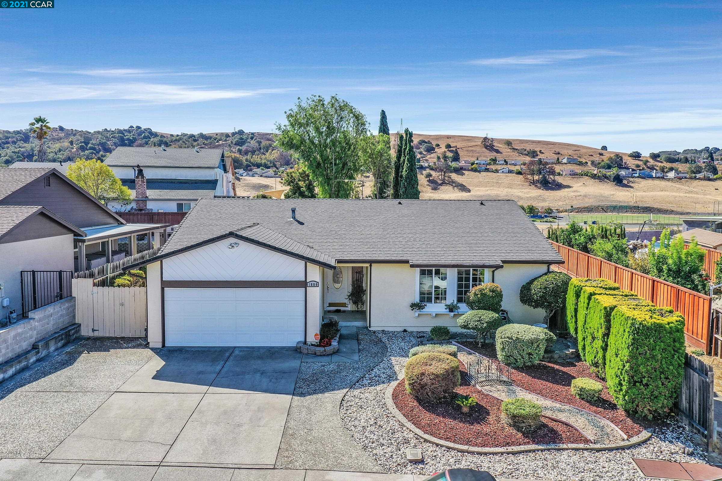 1880 Redwood Road Hercules, CA 94547 - Photo 1 of 1 an aerial view of a house with garden space and outdoor seating