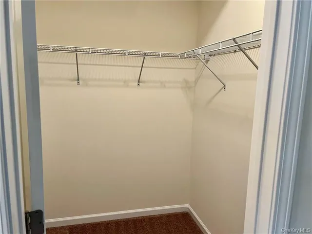 a view of small space with racks on the wall