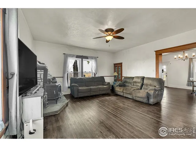 a kitchen with stainless steel appliances a stove sink microwave and cabinets