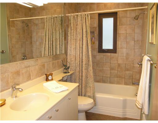 825 Old Mill Road Fox Chapel, PA 15238 - Photo 11 of 17 Other. Main hall bath has been recently updated and features a rich blend of earth tones and textures.