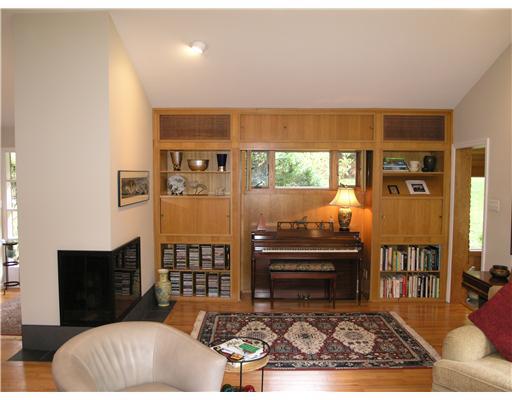 825 Old Mill Road Fox Chapel, PA 15238 - Photo 4 of 17 Living Room. Additional living room space highlighting the wrap around slate fireplace and wall of built-ins.