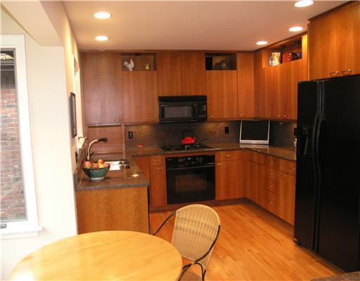 825 Old Mill Road Fox Chapel, PA 15238 - Photo 8 of 17 Kitchen. The stunning kitchen was recently renovated and offers rich cherry cabinets, some with glass fronts, granite countertops, granite backsplash, high end appliances and great lighting.