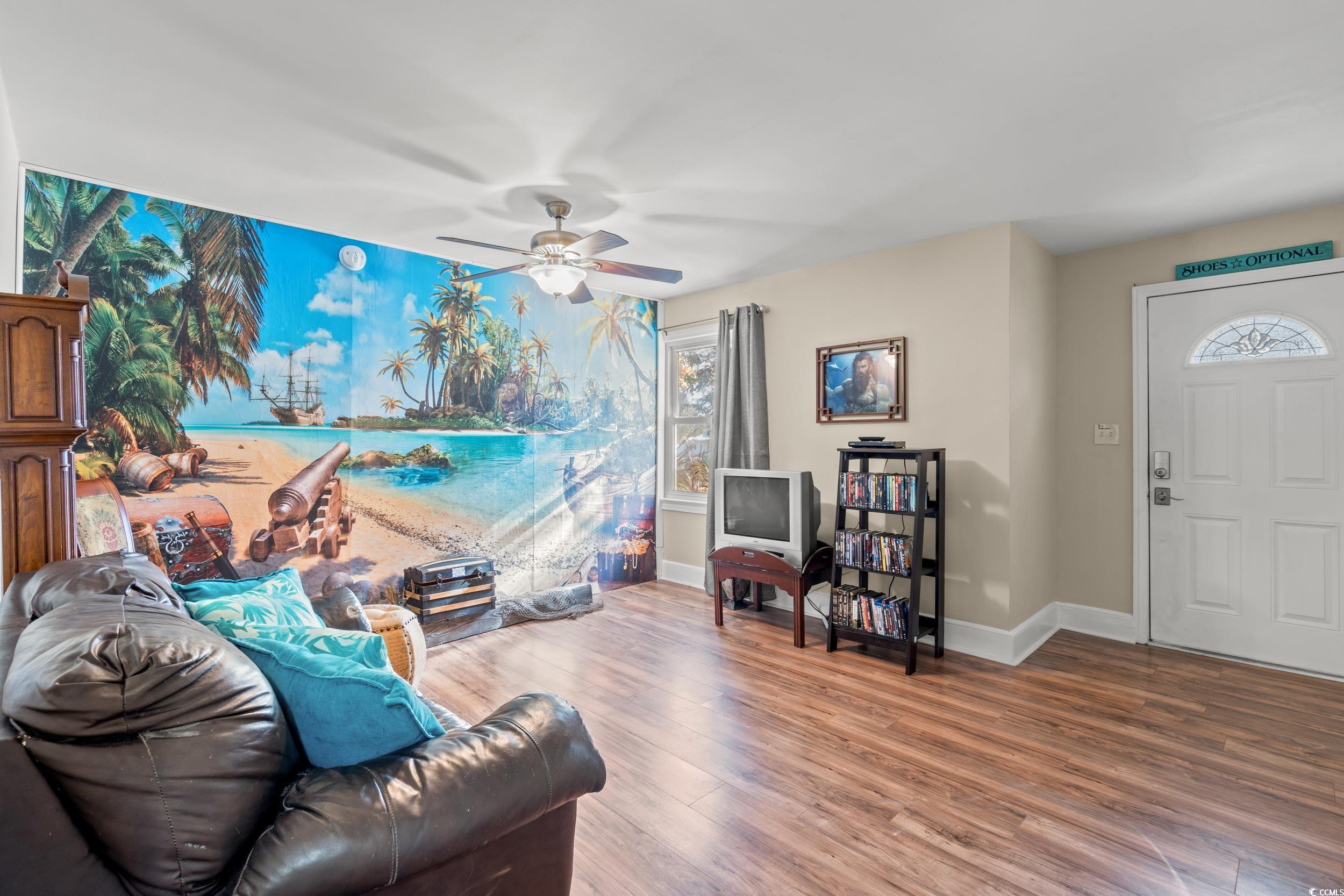 1605 Legion Street Myrtle Beach, SC 29577 - Photo 3 of 30 Living area featuring wood finished floors and a ceiling fan