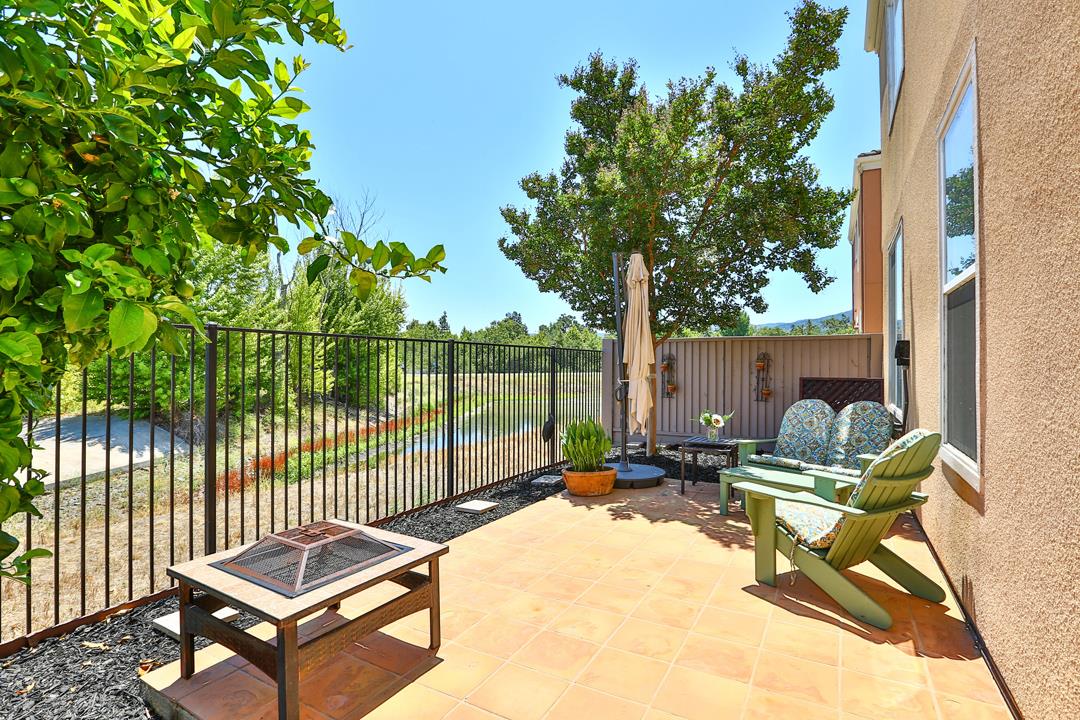 5769 Chambertin Drive San Jose, CA 95118 - Photo 8 of 8 a living room with a couch and a table