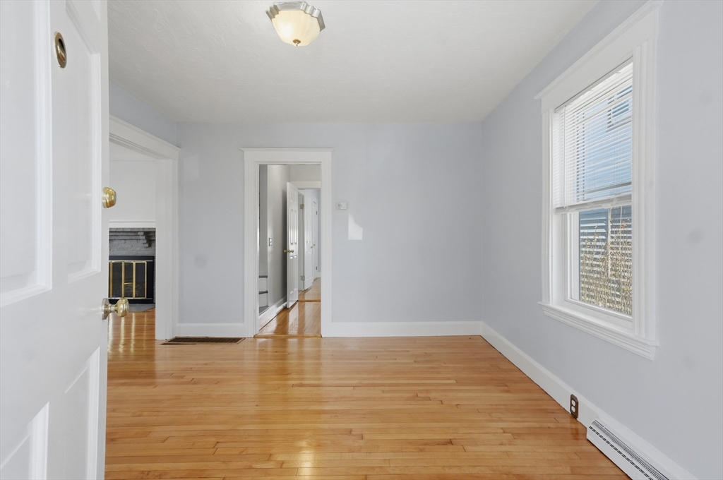 55 Addison Avenue Lynn, MA 01902 - Photo 7 of 23 a view of empty room with wooden floor and fan