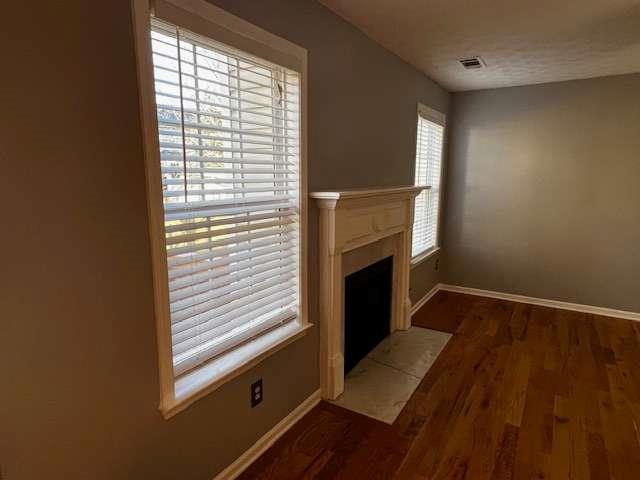 3721 Bogan Mill Road Northeast Buford, GA 30519 - Photo 14 of 41 a view of wooden floor and a fireplace in a room