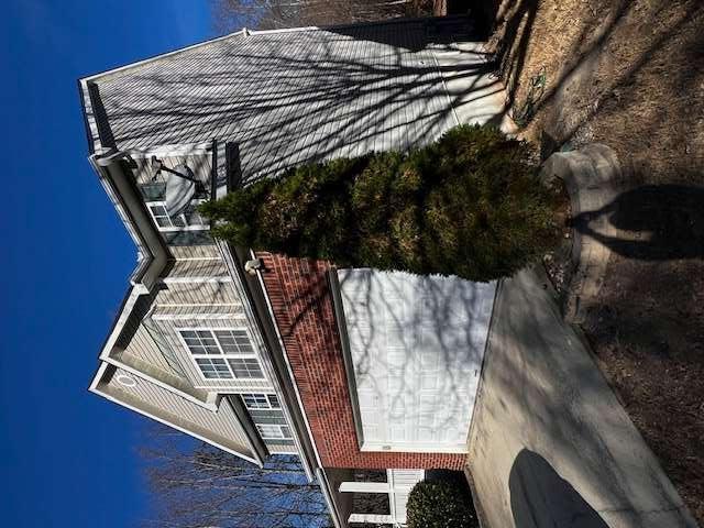 3721 Bogan Mill Road Northeast Buford, GA 30519 - Photo 2 of 41 a front view of a house with a yard