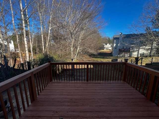 3721 Bogan Mill Road Northeast Buford, GA 30519 - Photo 40 of 41 a balcony with wooden floor