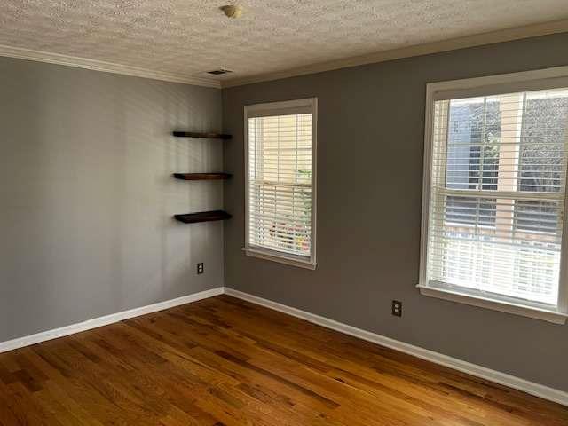 3721 Bogan Mill Road Northeast Buford, GA 30519 - Photo 5 of 41 a view of an empty room with wooden floor and a window