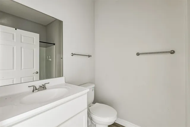 a bathroom with a shower and a shower