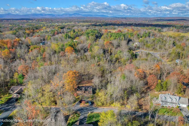 a view of a with large yard and mountain view