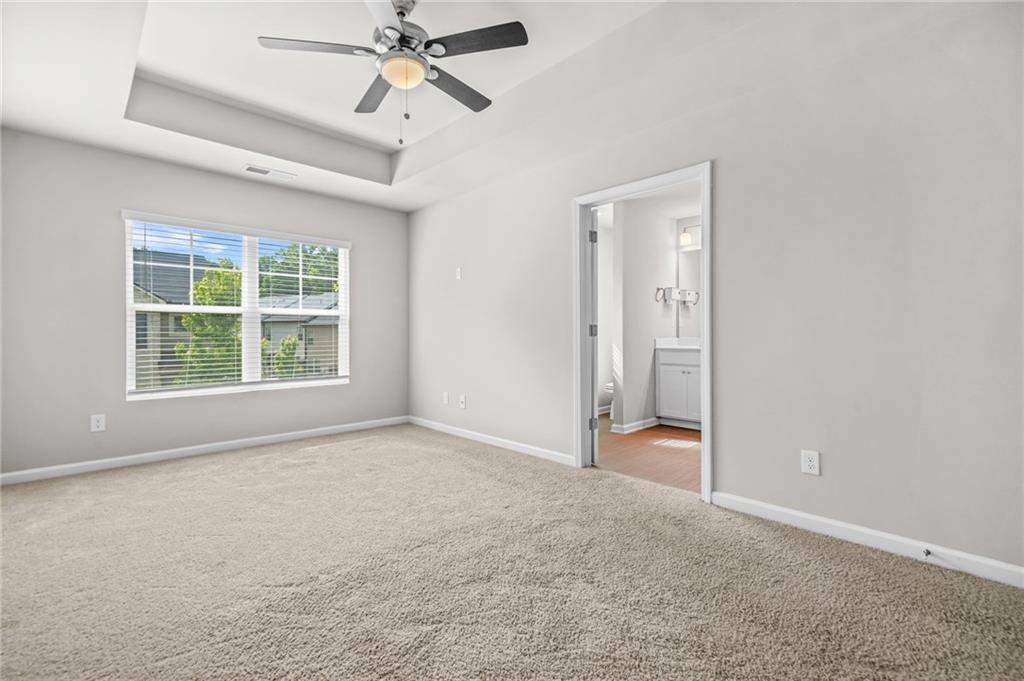 3181 Meadowstone Lane Southwest Atlanta, GA 30331 - Photo 14 of 27 an empty room with windows and closet