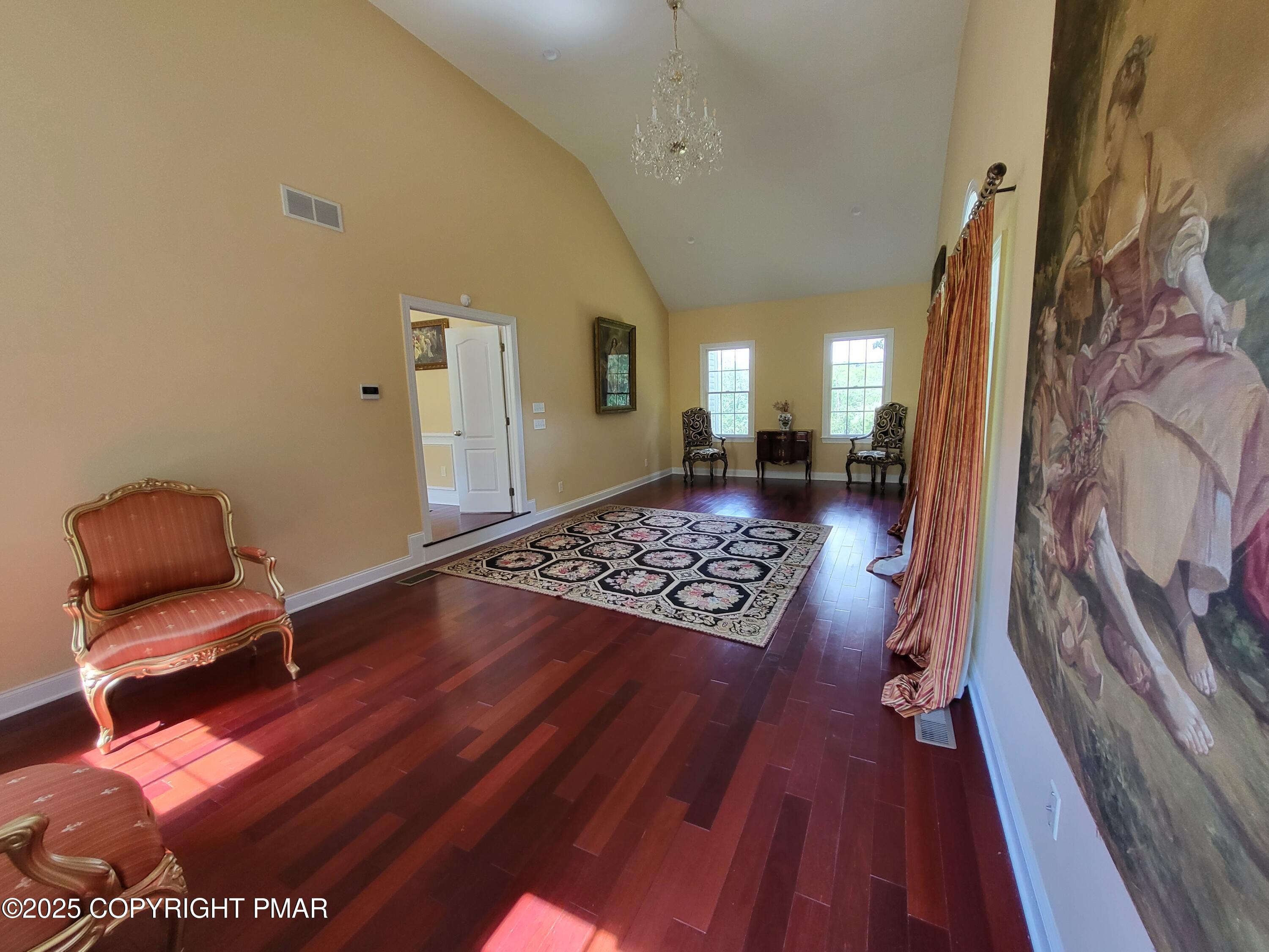 229 Rising Meadow Way East Stroudsburg, PA 18302 - Photo 14 of 73 a living room with a rug and a rug