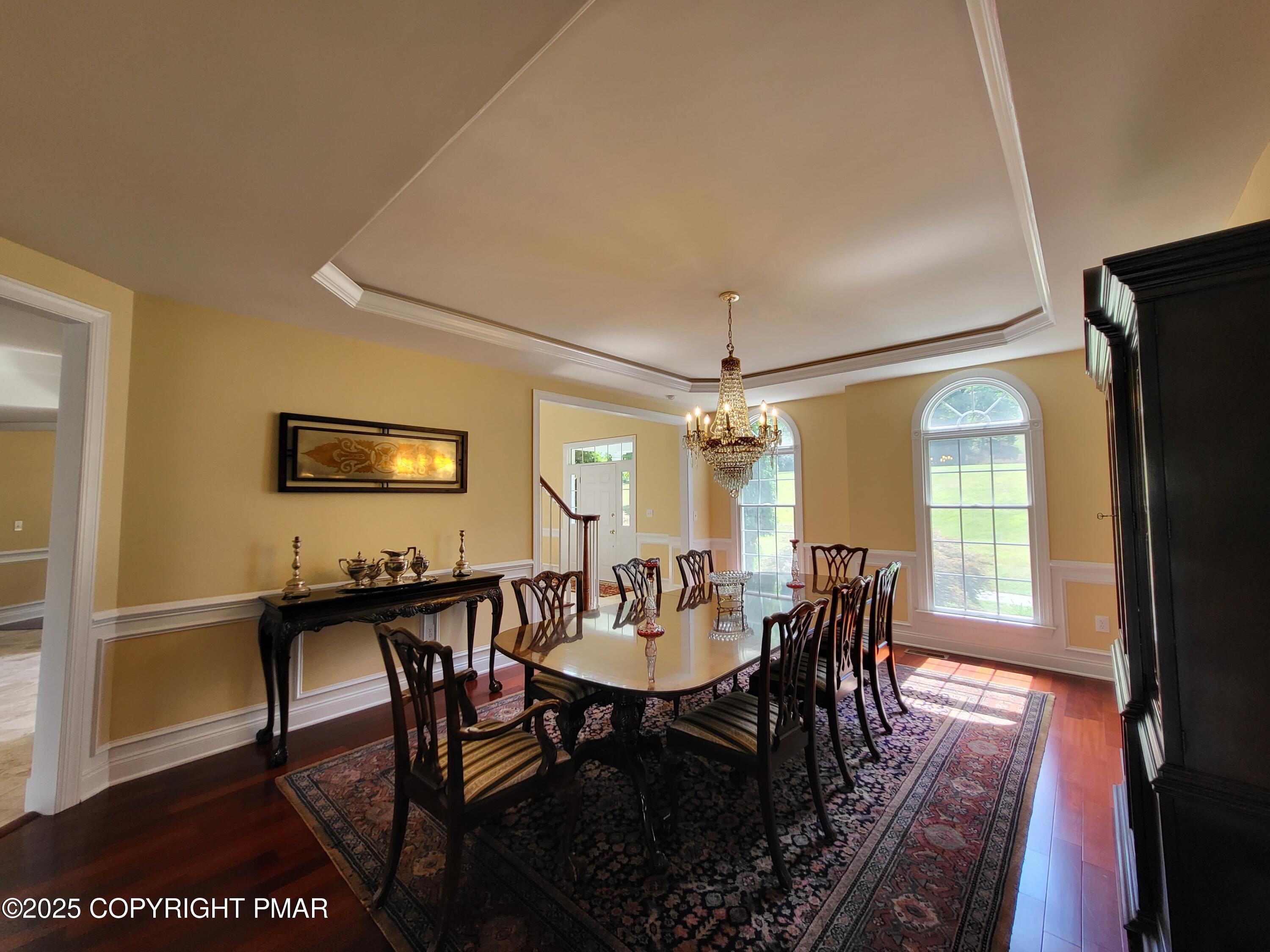 229 Rising Meadow Way East Stroudsburg, PA 18302 - Photo 19 of 73 a view of a a dining room with furniture window and wooden floor