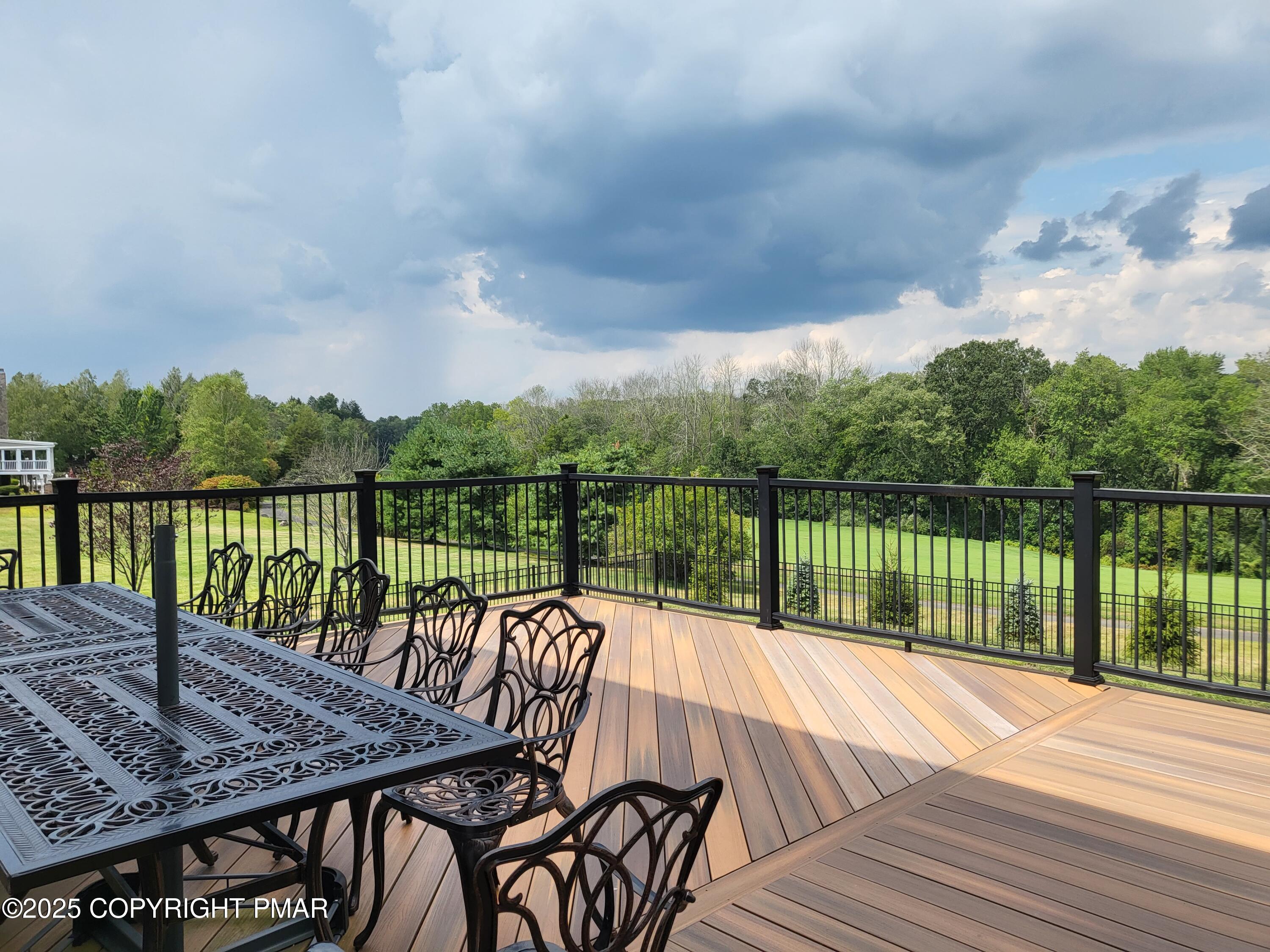 229 Rising Meadow Way East Stroudsburg, PA 18302 - Photo 71 of 73 a view of a balcony with wooden floor and outdoor space