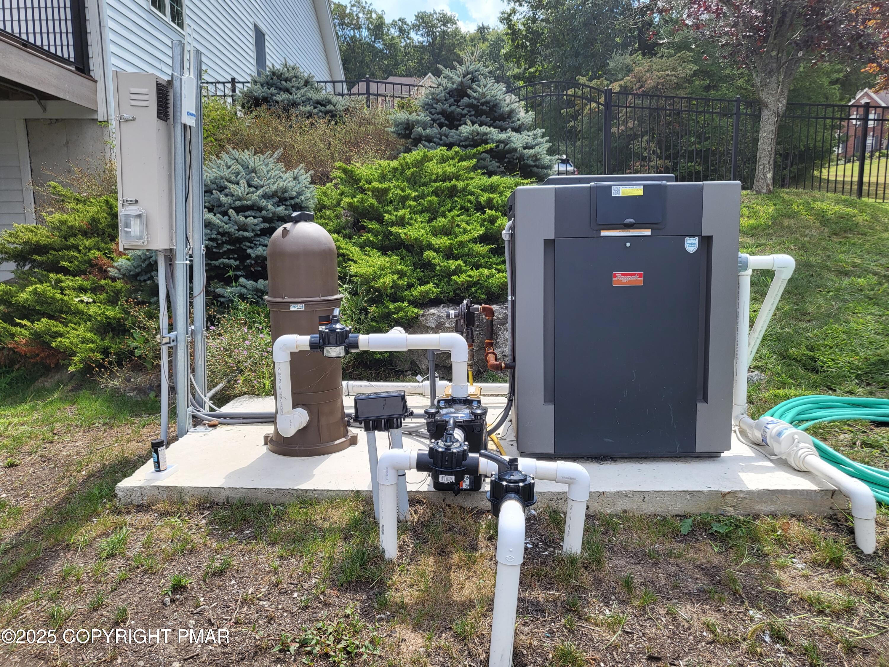 229 Rising Meadow Way East Stroudsburg, PA 18302 - Photo 72 of 73 a view of a patio with table and chairs potted plants with wooden floor