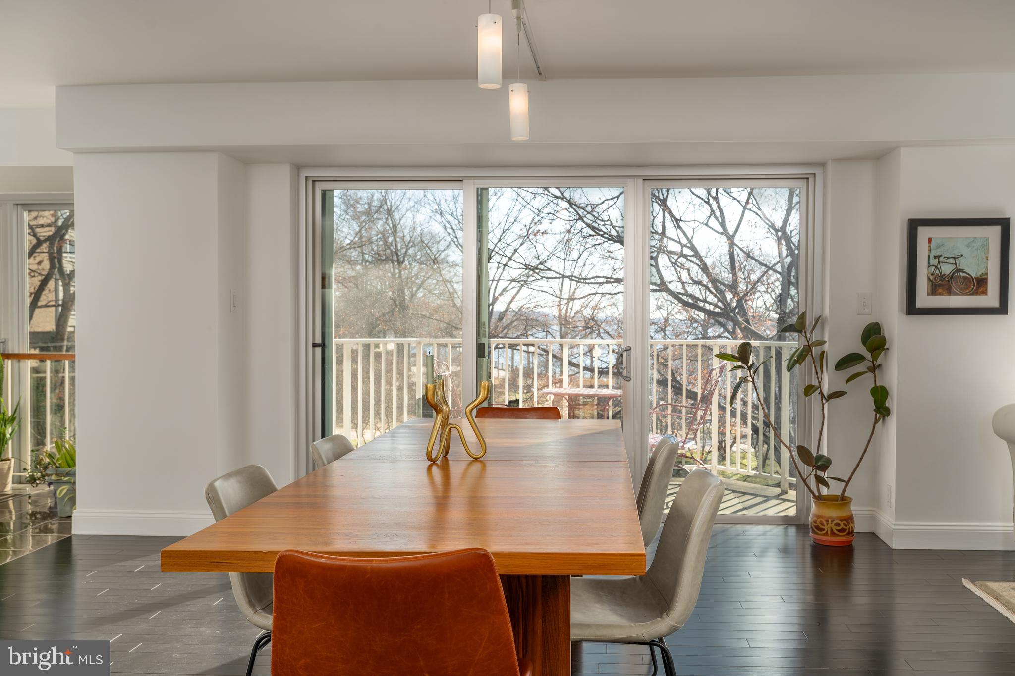 550 N Street Southwest, Unit S201 Washington, DC 20024 - Photo 11 of 63 a view of a dining room with furniture window and wooden floor
