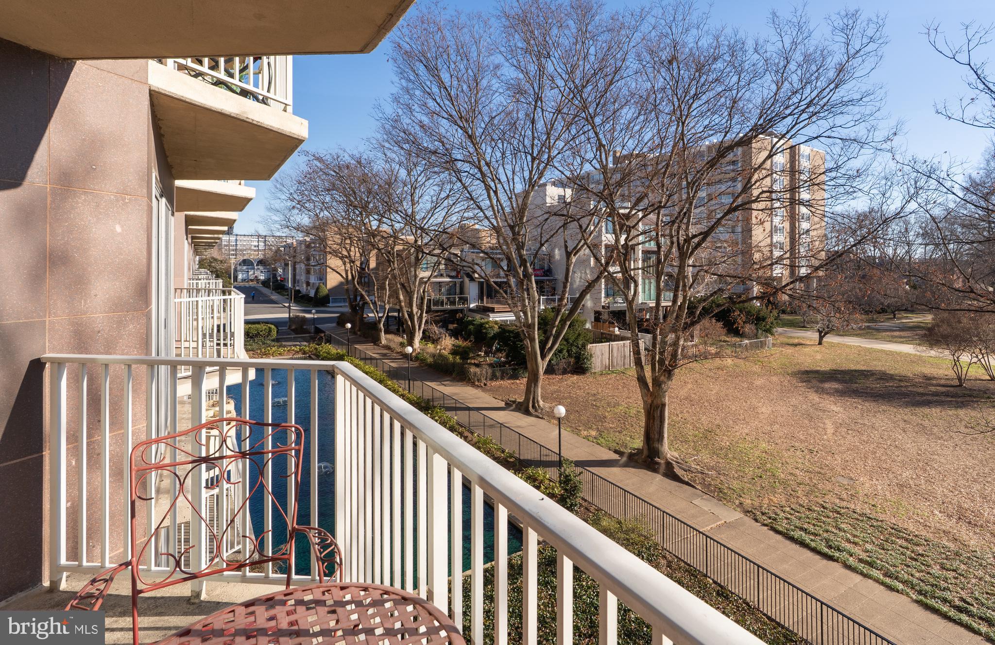 550 N Street Southwest, Unit S201 Washington, DC 20024 - Photo 43 of 63 a view of balcony with wooden floor and fence