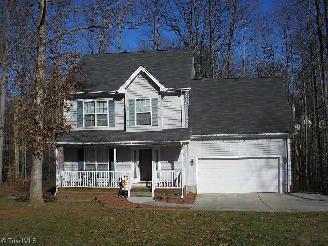 7912 Daltonshire Drive Oak Ridge, NC 27310 - Photo 1 of 9 Exterior Front.
