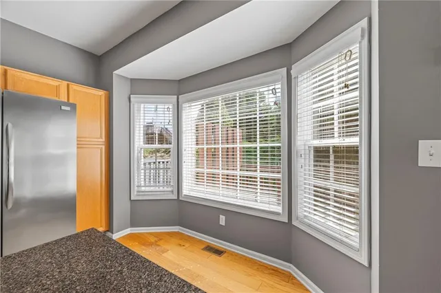 a view of a bedroom with a large window