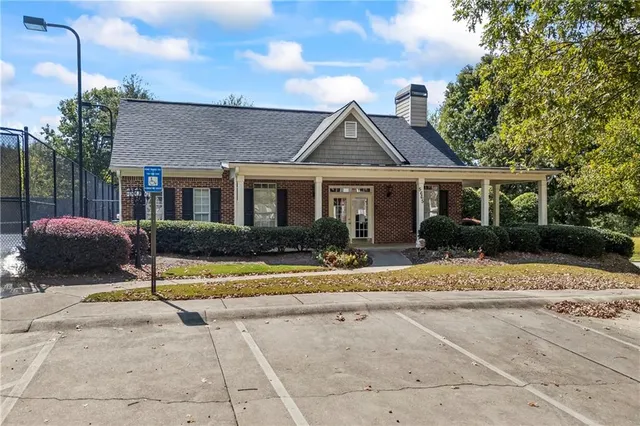 an aerial view of a house with a garden