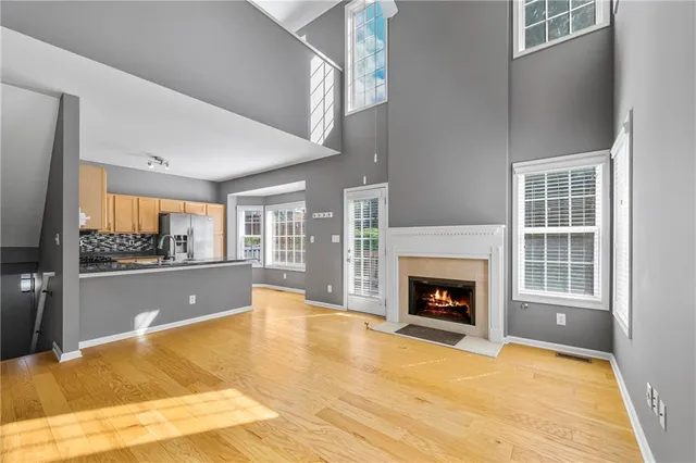 a view of livingroom with furniture fire place and window