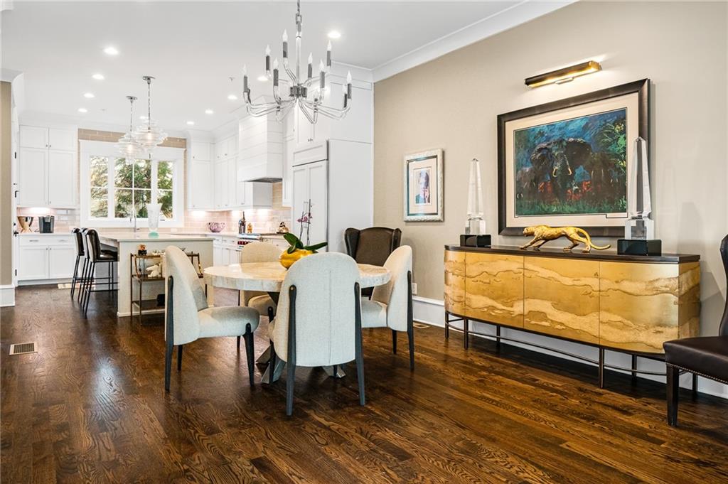 3715 Peachtree Road, Unit 2 Atlanta, GA 30319 - Photo 13 of 51 a view of a dining room with furniture window and wooden floor