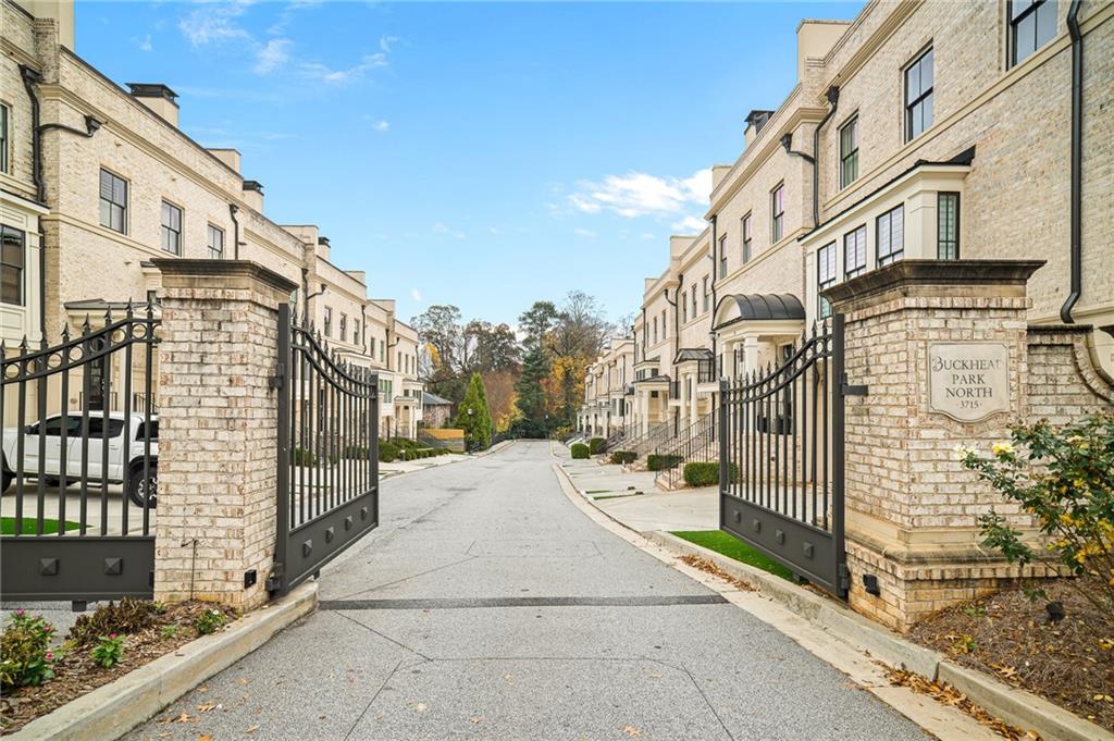 3715 Peachtree Road, Unit 2 Atlanta, GA 30319 - Photo 2 of 51 a city street with tall buildings