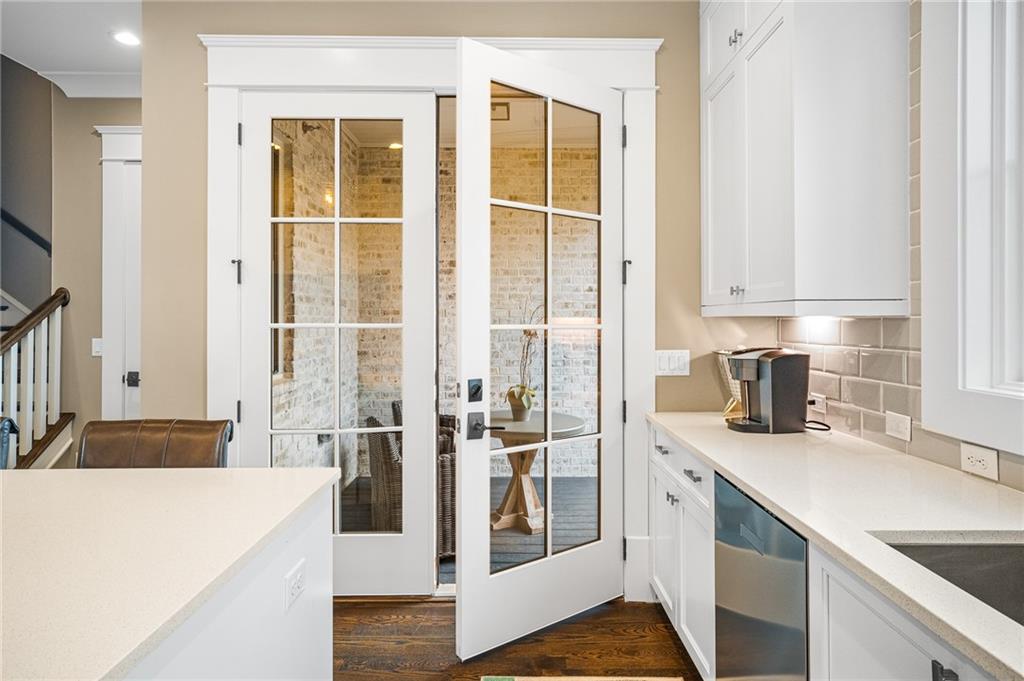 3715 Peachtree Road, Unit 2 Atlanta, GA 30319 - Photo 21 of 51 a kitchen with a refrigerator and a sink