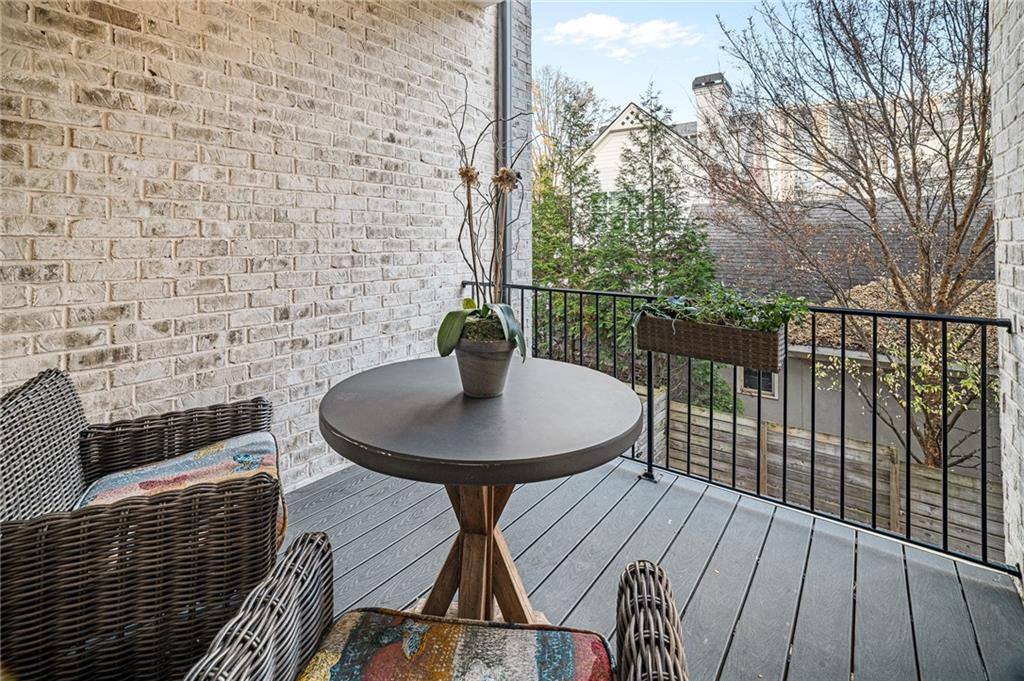3715 Peachtree Road, Unit 2 Atlanta, GA 30319 - Photo 25 of 51 a balcony with table and chairs