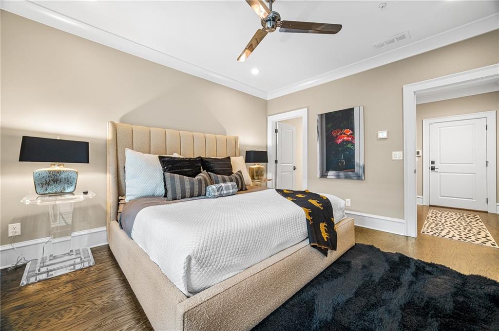 3715 Peachtree Road, Unit 2 Atlanta, GA 30319 - Photo 29 of 51 a bedroom with a bed and a lamp