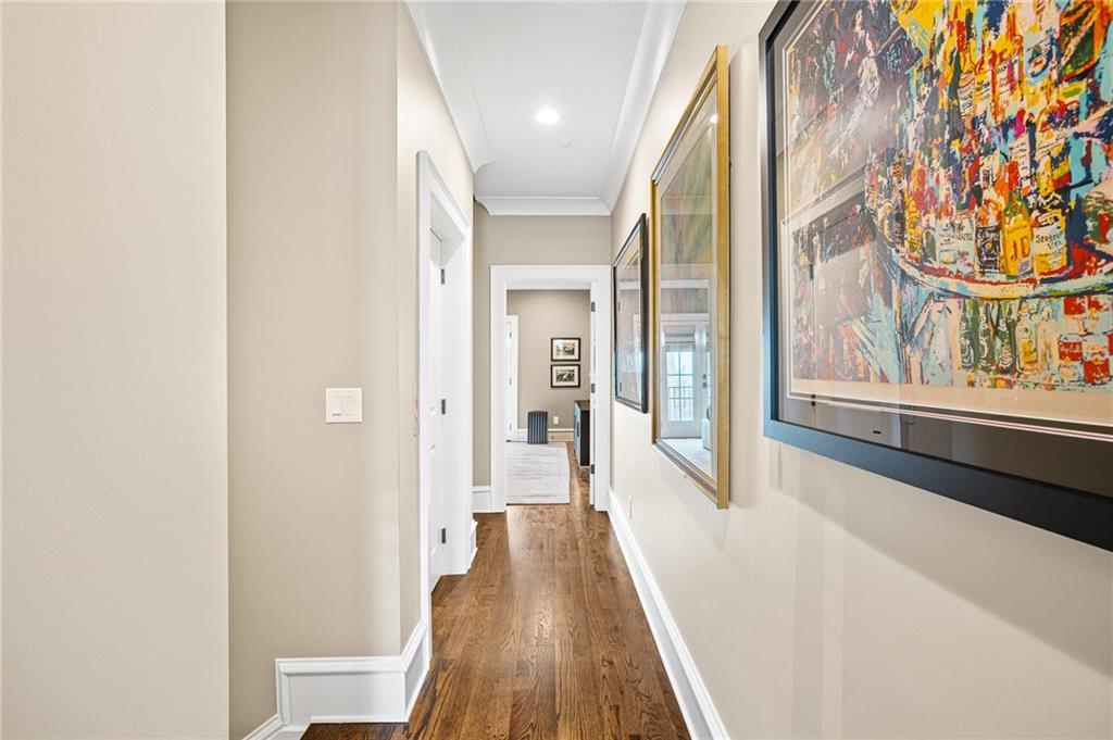 3715 Peachtree Road, Unit 2 Atlanta, GA 30319 - Photo 33 of 51 a view of a hallway with wooden floor and glass doors