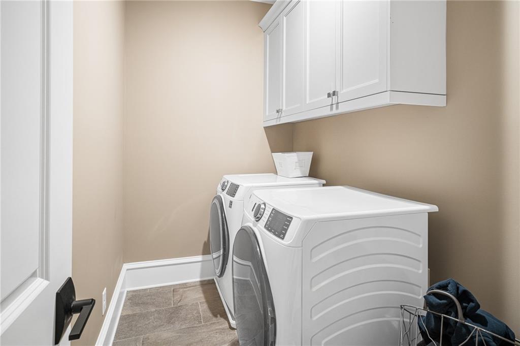 3715 Peachtree Road, Unit 2 Atlanta, GA 30319 - Photo 34 of 51 a utility room with dryer and washer