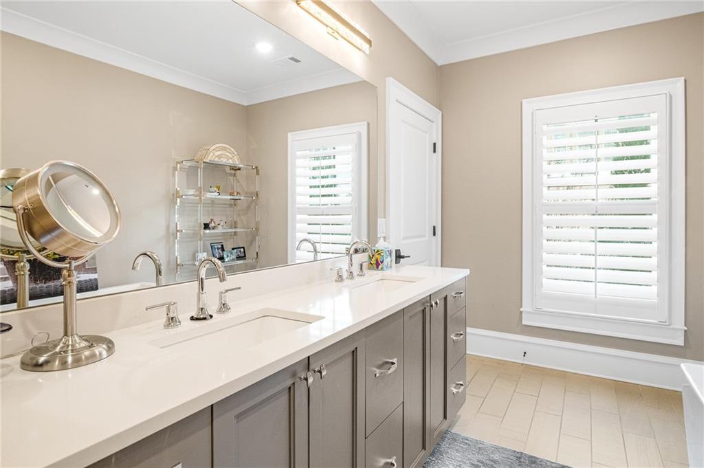 3715 Peachtree Road, Unit 2 Atlanta, GA 30319 - Photo 40 of 51 a bathroom with a double vanity sink and a mirror