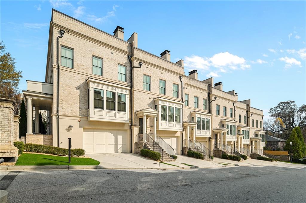 3715 Peachtree Road, Unit 2 Atlanta, GA 30319 - Photo 4 of 51 a view of a building with a street