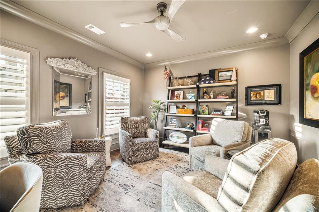 3715 Peachtree Road, Unit 2 Atlanta, GA 30319 - Photo 42 of 51 a living room with furniture and a book shelf