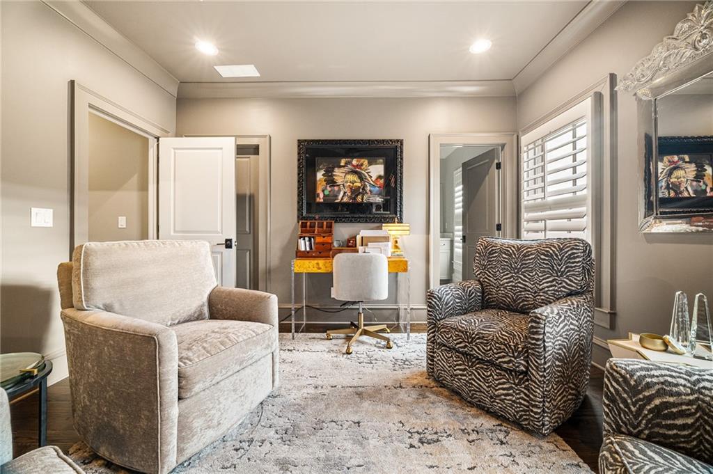 3715 Peachtree Road, Unit 2 Atlanta, GA 30319 - Photo 43 of 51 a living room with furniture and a flat screen tv