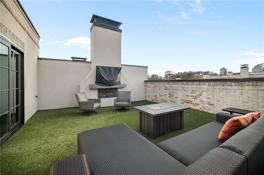 3715 Peachtree Road, Unit 2 Atlanta, GA 30319 - Photo 50 of 51 a terrace of a house with outdoor seating