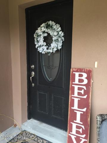 3725 Carter Road Mims, FL 32754 - Photo 4 of 24 carter front door