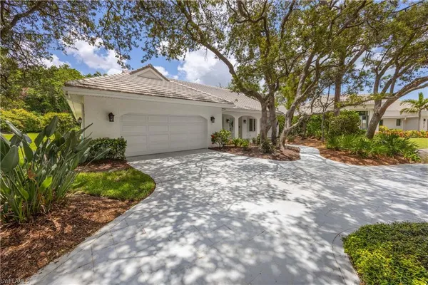 $25,000 | 816 Turkey Oak Lane, Naples, FL 34108