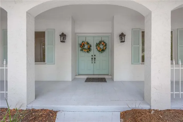 a view of an entryway with a rug