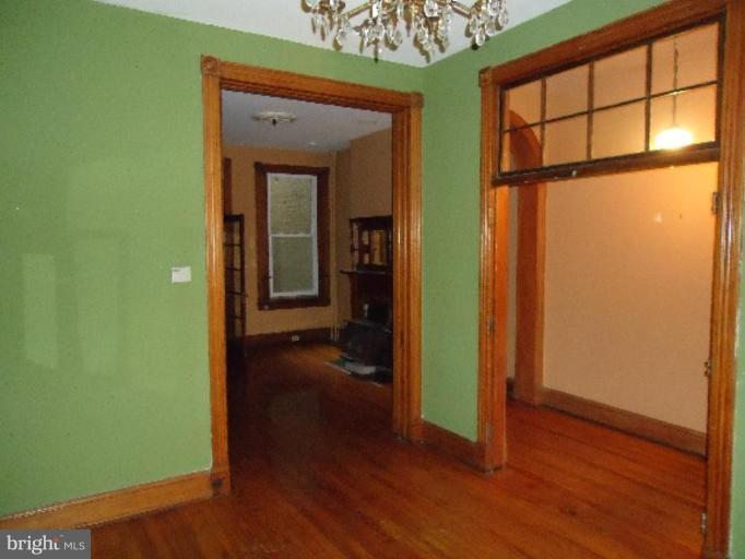 54 R Street Northeast Washington, DC 20002 - Photo 5 of 6 a view of a room with wooden floor