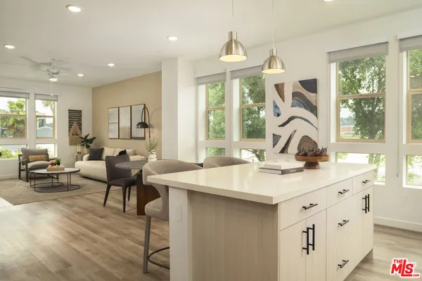 a view of a a dining room kitchen with furniture window and outside view