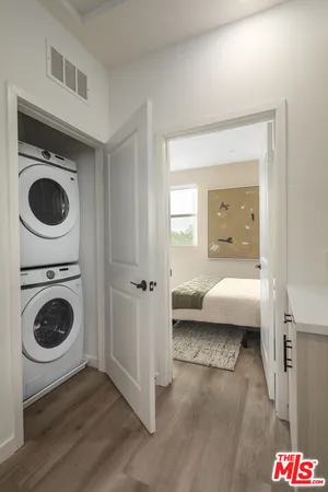 a en suite bathroom with a toilet and a sink