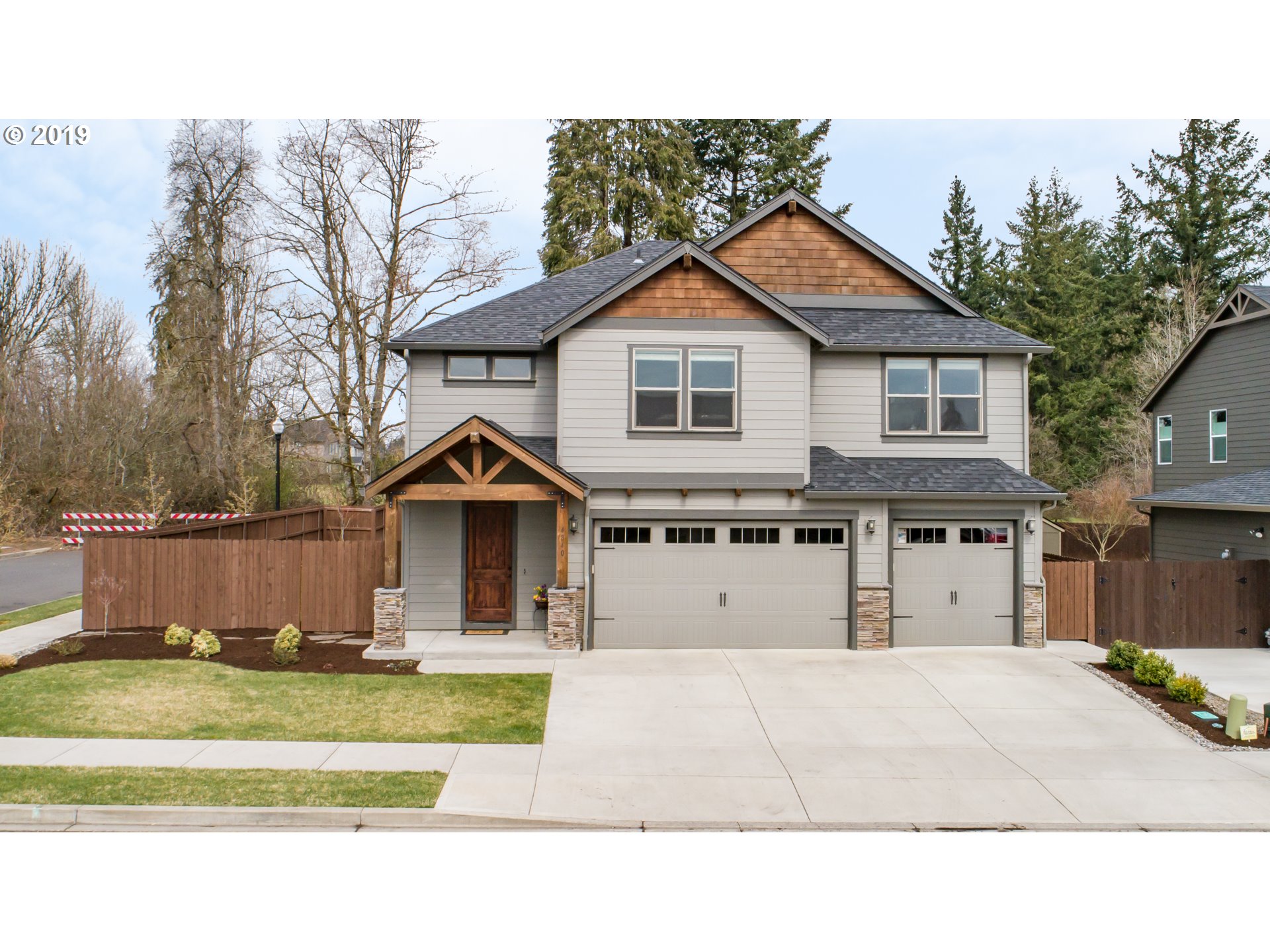 4840 North 8th Street Ridgefield, WA 98642 - Photo 1 of 31 a front view of a house with a yard