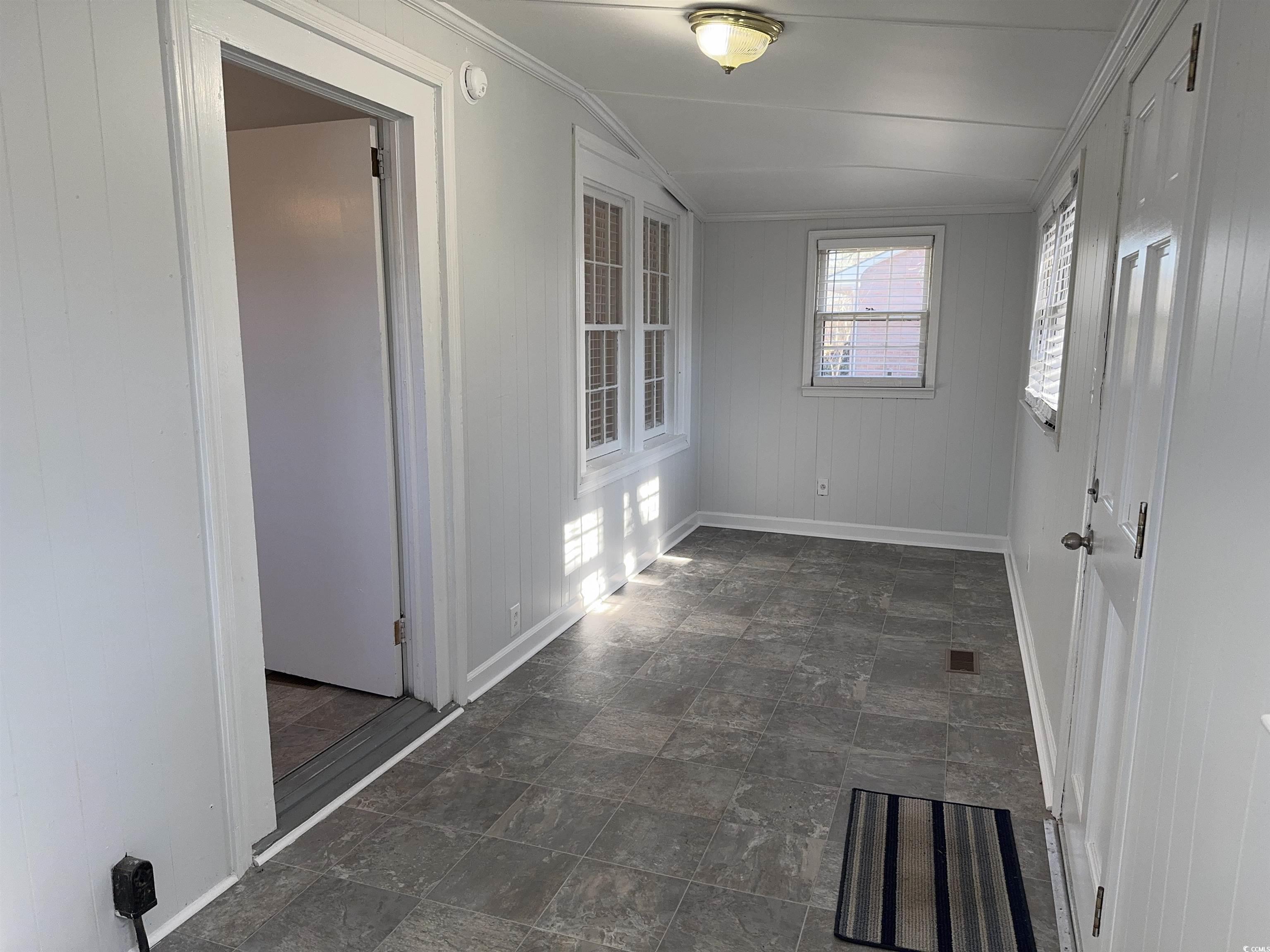 202 Lewis Street Mullins, SC 29574 - Photo 15 of 23 Hallway with lofted ceiling