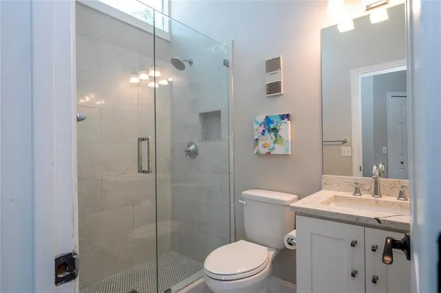 a room with lots of furniture and a window