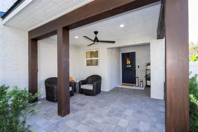 a view of a large garden with plants and large trees
